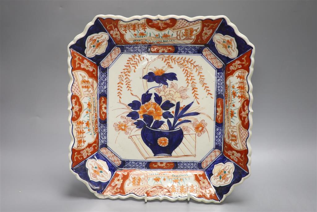 A Dresden porcelain three handled cup, an Imari dish and one other dish